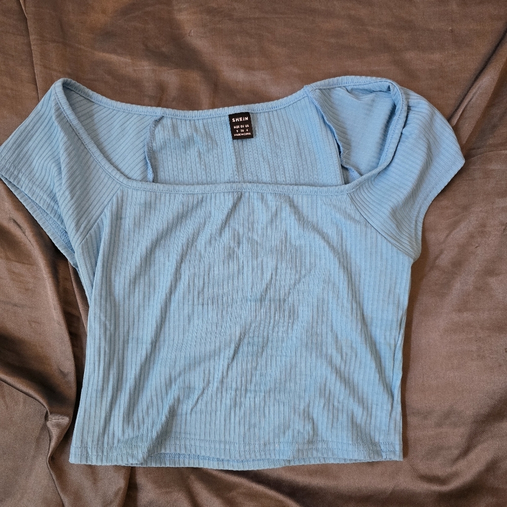 teal crop top